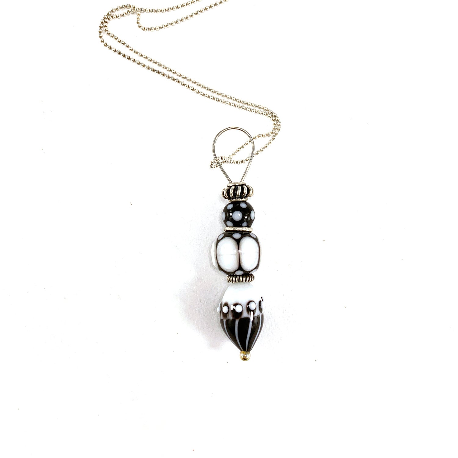 Stacked Bead Pendant in Black and White on a White background